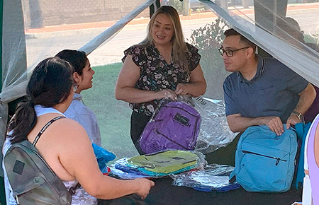 Volunteering at Backpack Booth