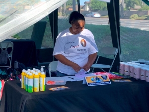 Volunteer checking backpack preparations