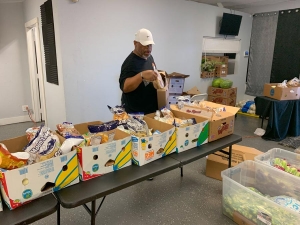 Church food giveaway team in motion