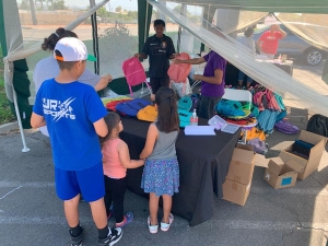 Waiting for their backpacks