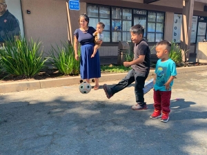 Boy kicking soccer ball