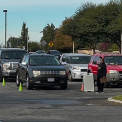 Cars ready for Turkey Giveaway Drive Thru