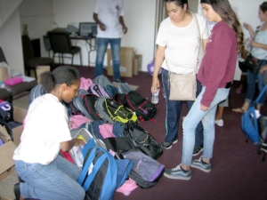 Selena with backpacks