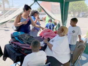 Kid picking out backpack