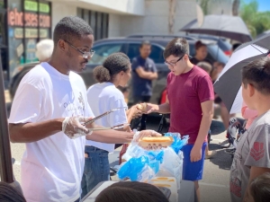 Minister Jordan at hotdog station
