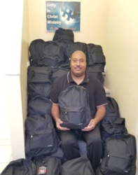 Pastor Billy Davis with Backpacks
